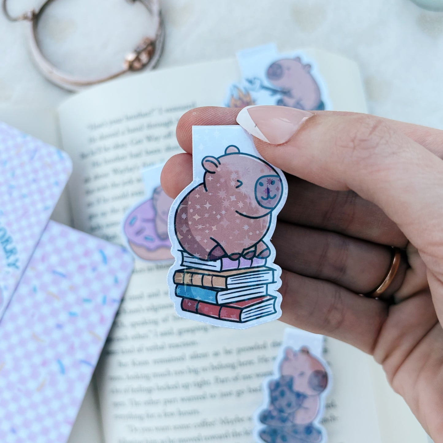 Capybara and stack of books magnetic bookmark