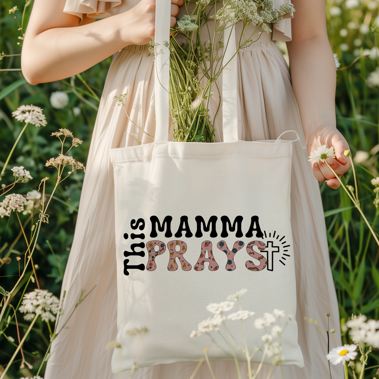 This mamma prays tote bag